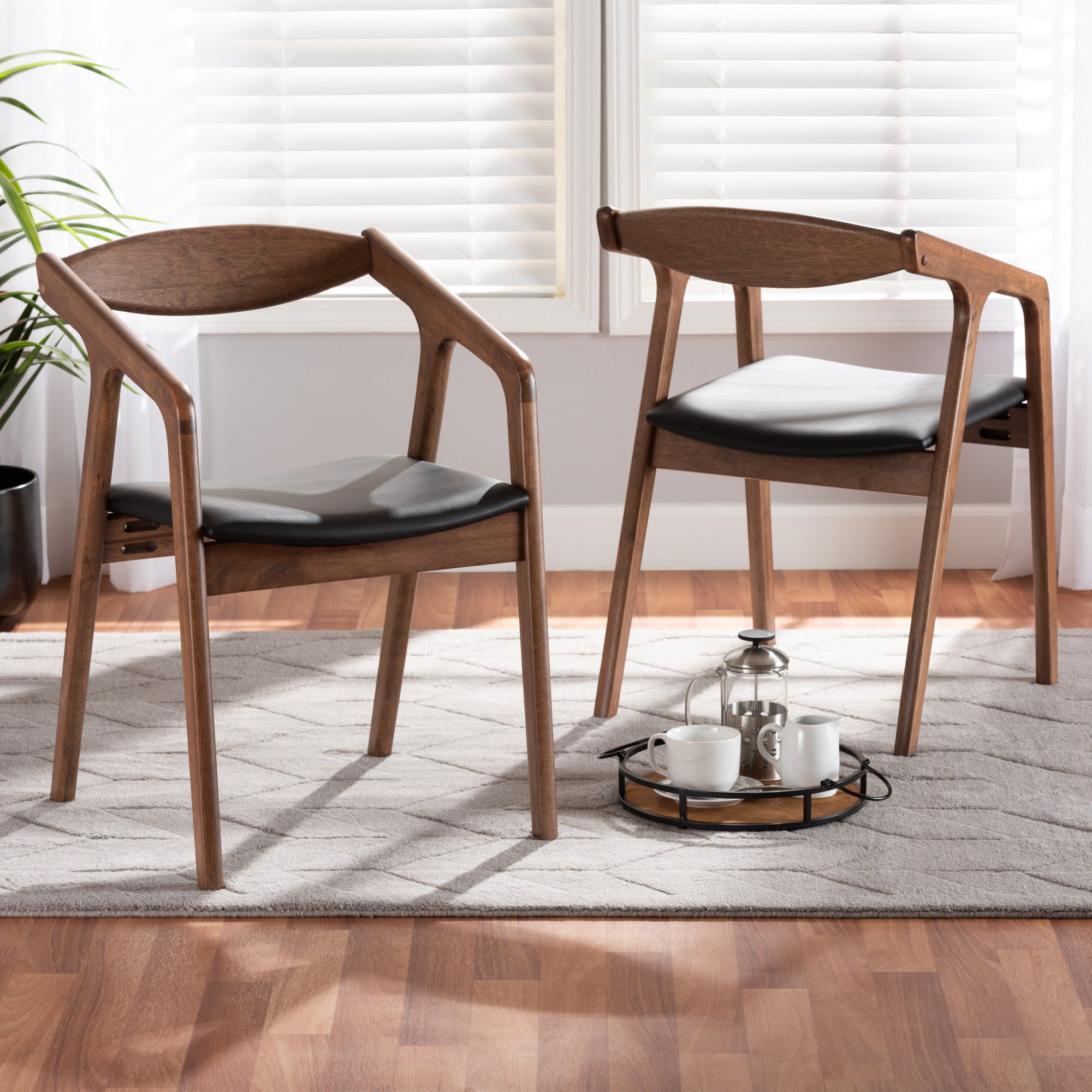 Baxton Studio Harland Mid-Century Modern Black Faux Leather Upholstered and Walnut Brown Finished Wood 2-Piece Dining Chair Set