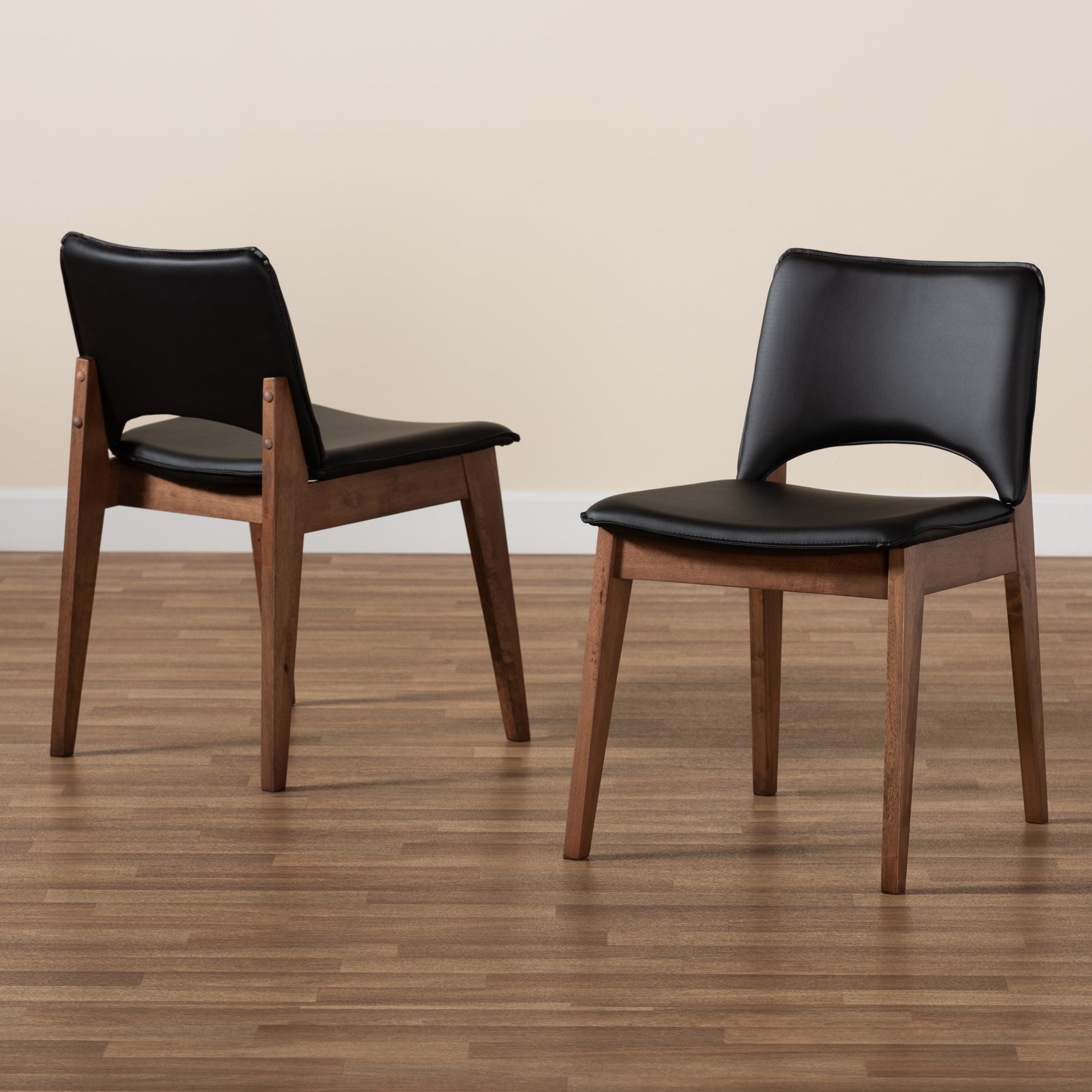 Baxton Studio Afton Mid-Century Modern Black Faux Leather Upholstered and Walnut Brown Finished Wood 2-Piece Dining Chair Set