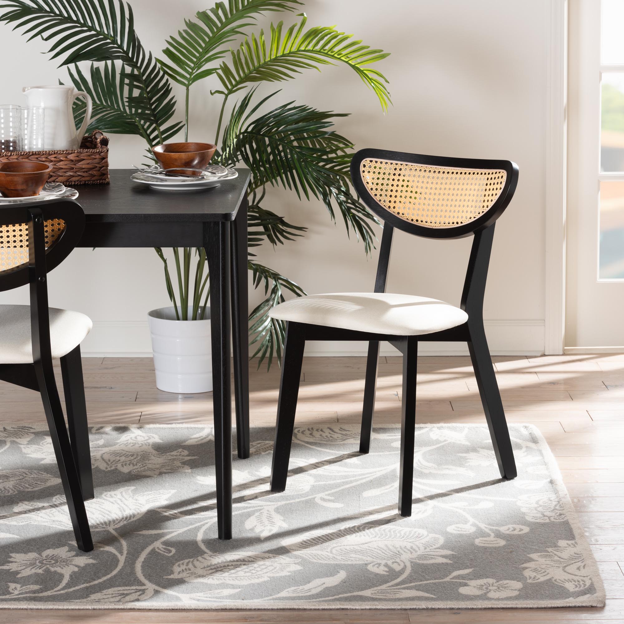 Baxton Studio Dannell Mid-Century Modern Cream Fabric and Black Finished Wood 2-Piece Dining Chair Set