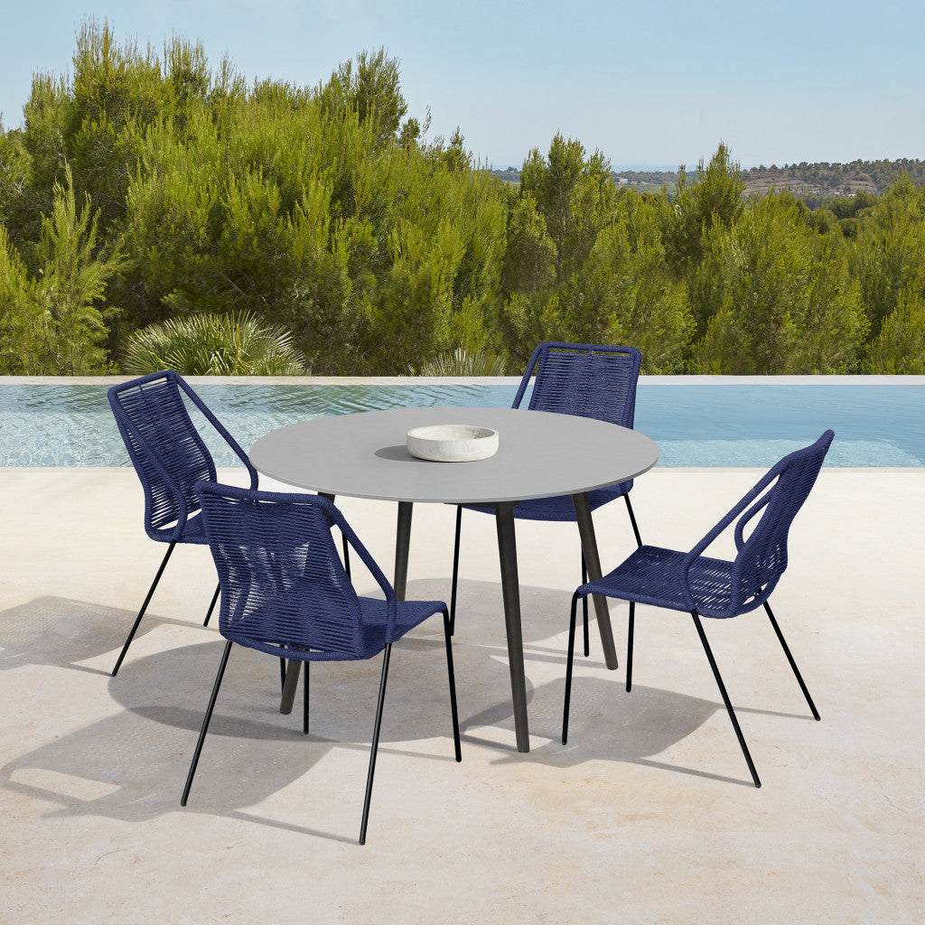 Five Piece Gray and Black Round Stone Dining Set with Four Chairs
