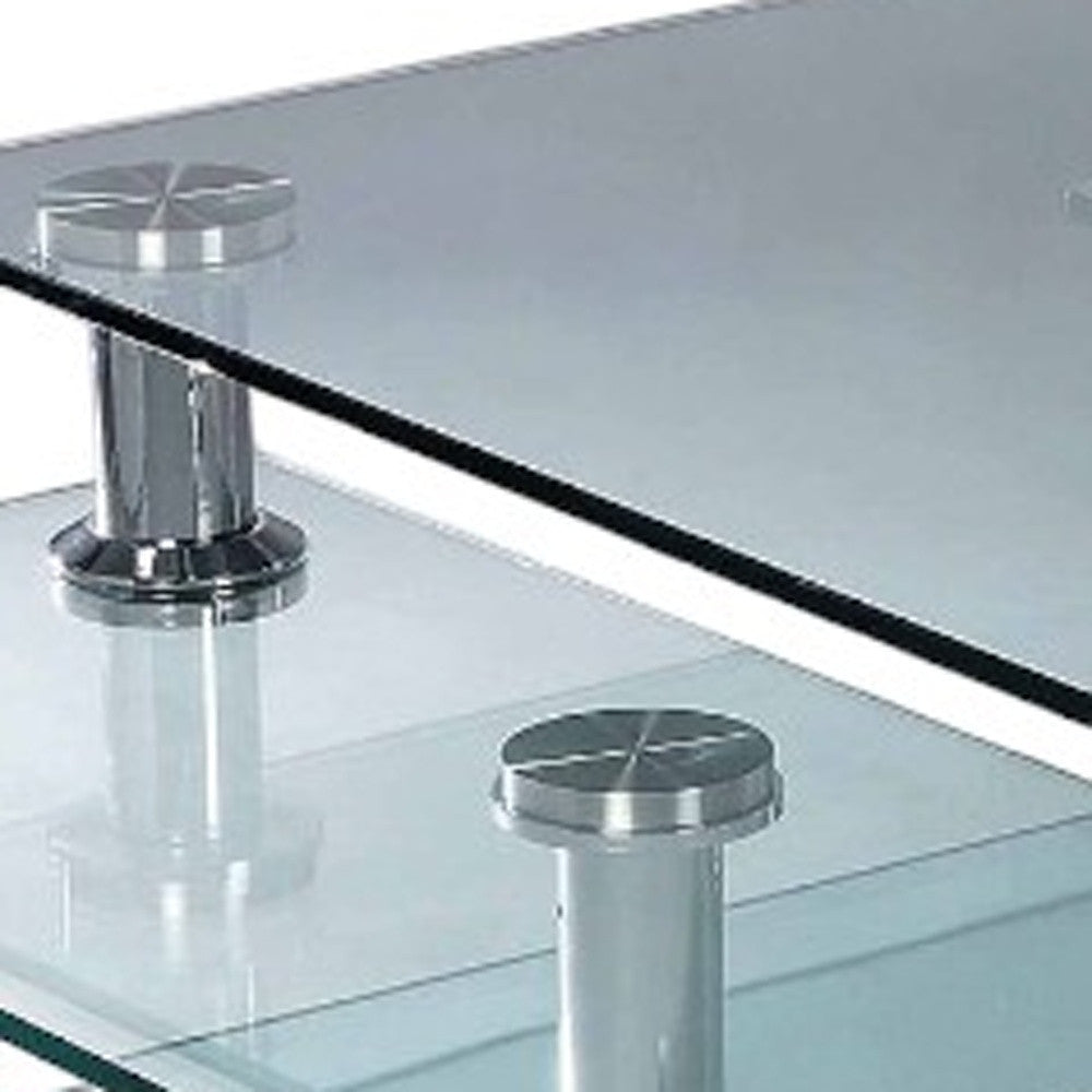 32" Clear and Silver Glass and Metal Coffee Table With Three Shelves