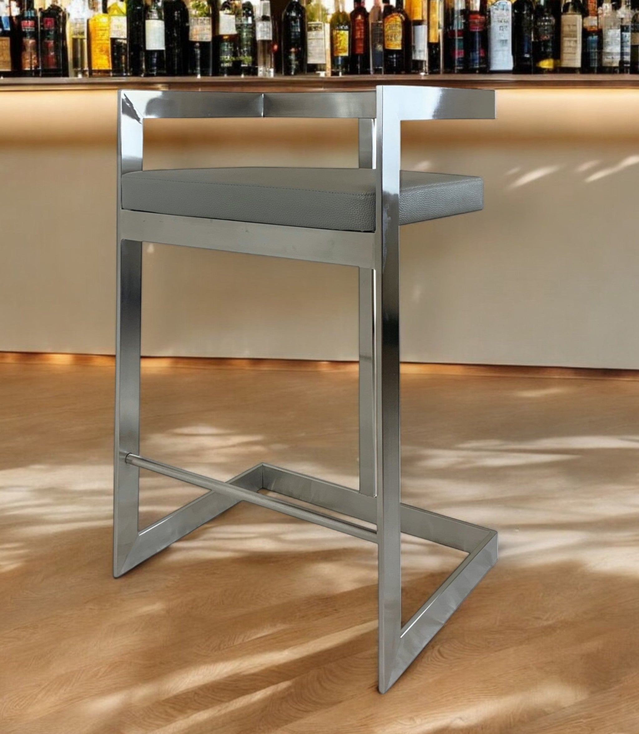 26" Gray and Silver Faux Leather and Metal Low Back Counter Height Bar Chair