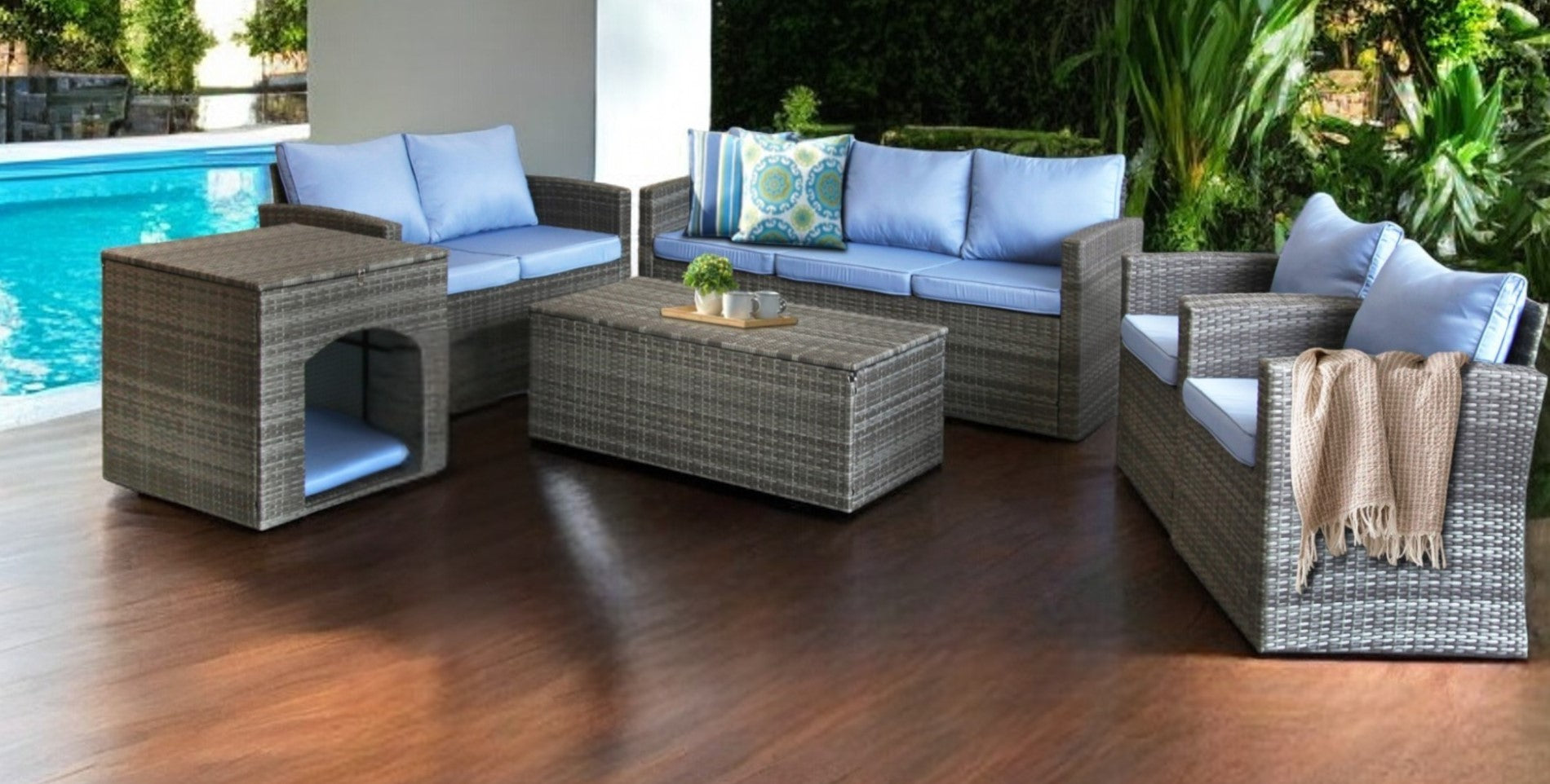 Six Piece Outdoor Gray Wicker Sofa Seating Group with Light Blue Cushions