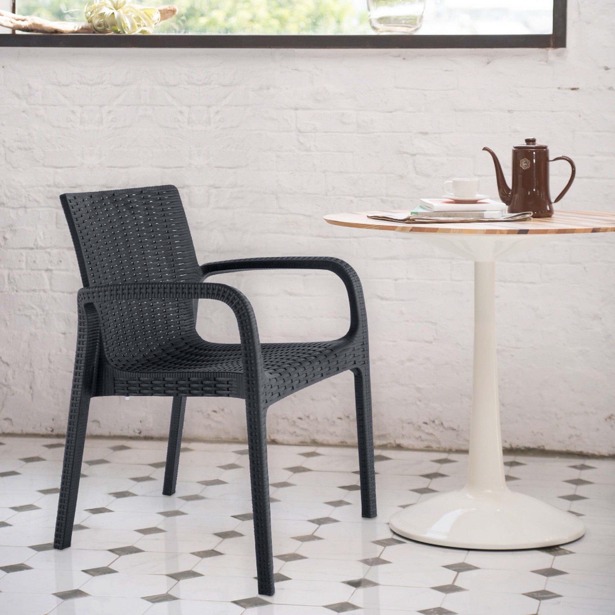 Set of Two Black Faux Rattan Heavy Duty Plastic Outdoor Stacking Arm Chairs