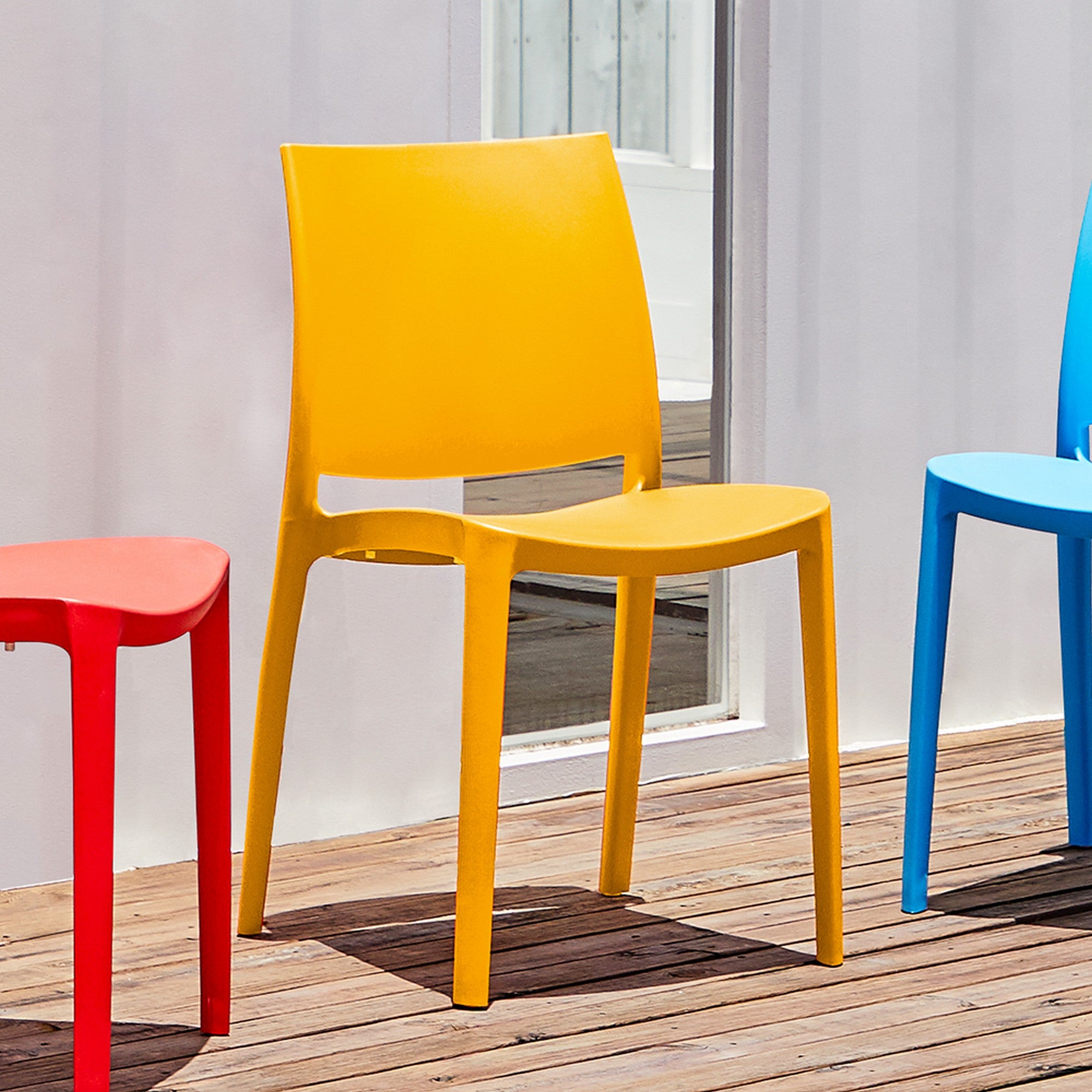 Set of Four Gold Heavy Duty Plastic Outdoor Stacking Dining Chairs