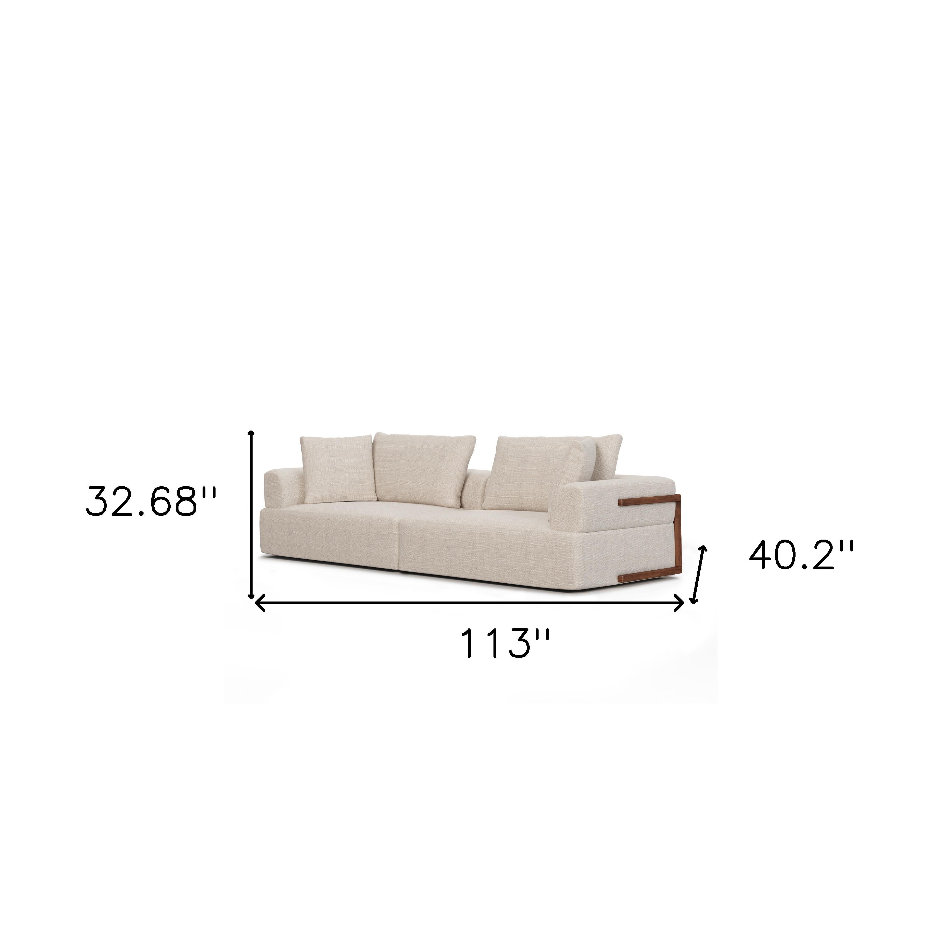 113" Cream Fabric Sofa And Toss Pillows