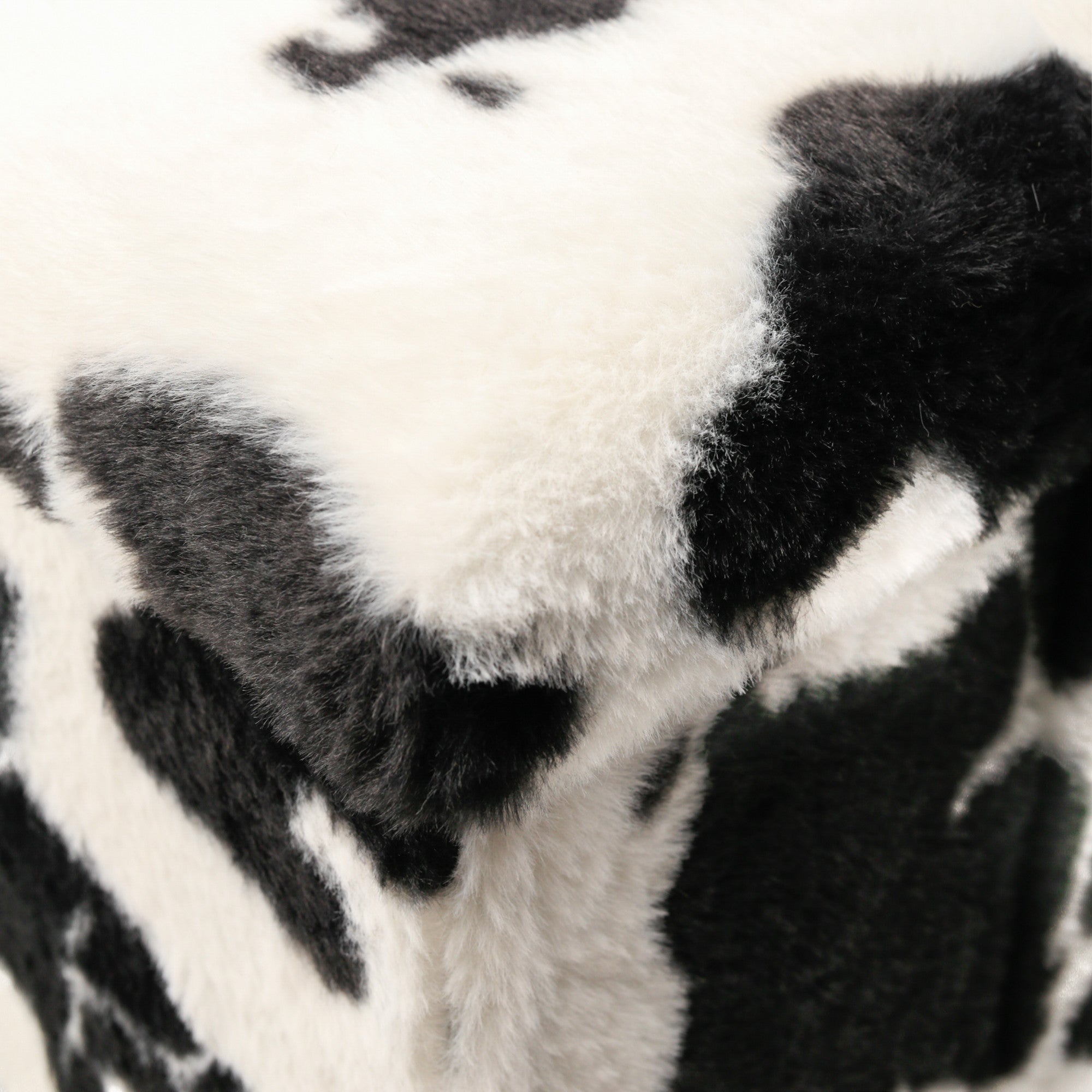 12" Black and White Faux Fur Cow Print Storage Ottoman