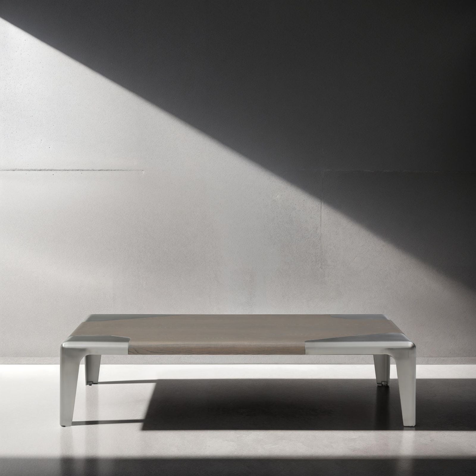 57" Light Gray and Silver Wood and Stainless Steel Coffee Table