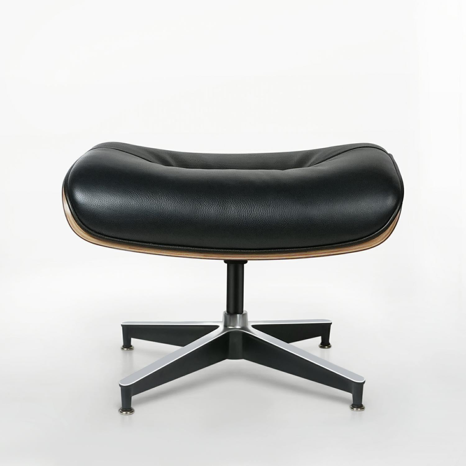 33" Black and Walnut Leather And Wood Swivel Lounge Chair With Ottoman
