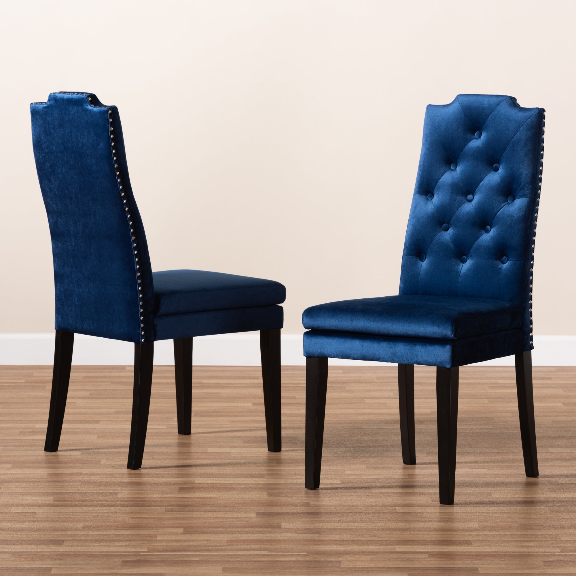 Baxton Studio Dylin Modern and Contemporary Navy Blue Velvet Fabric Upholstered Button Tufted Wood Dining Chair Set of 2