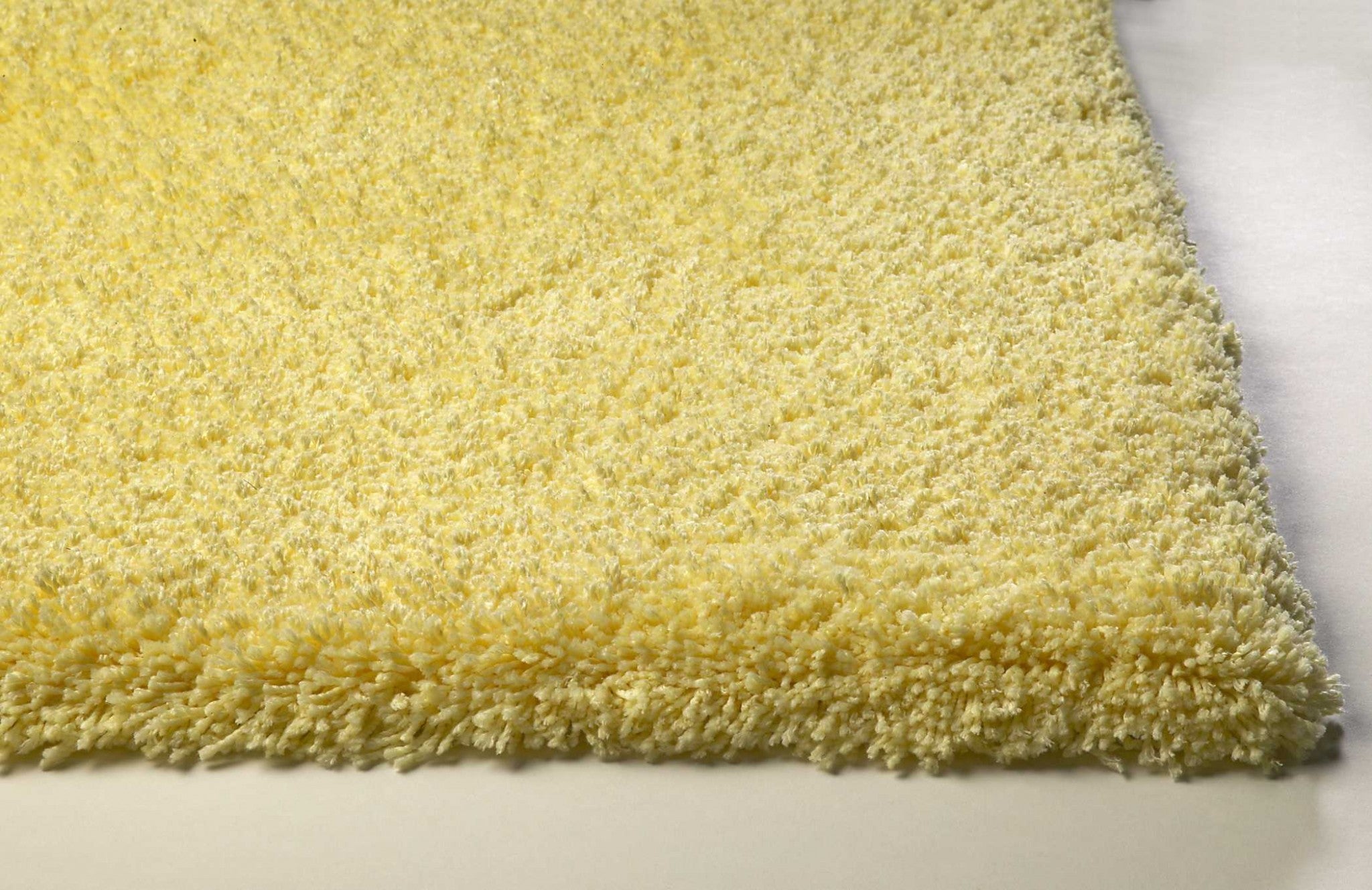 9' x 13' Polyester Canary Yellow Area Rug