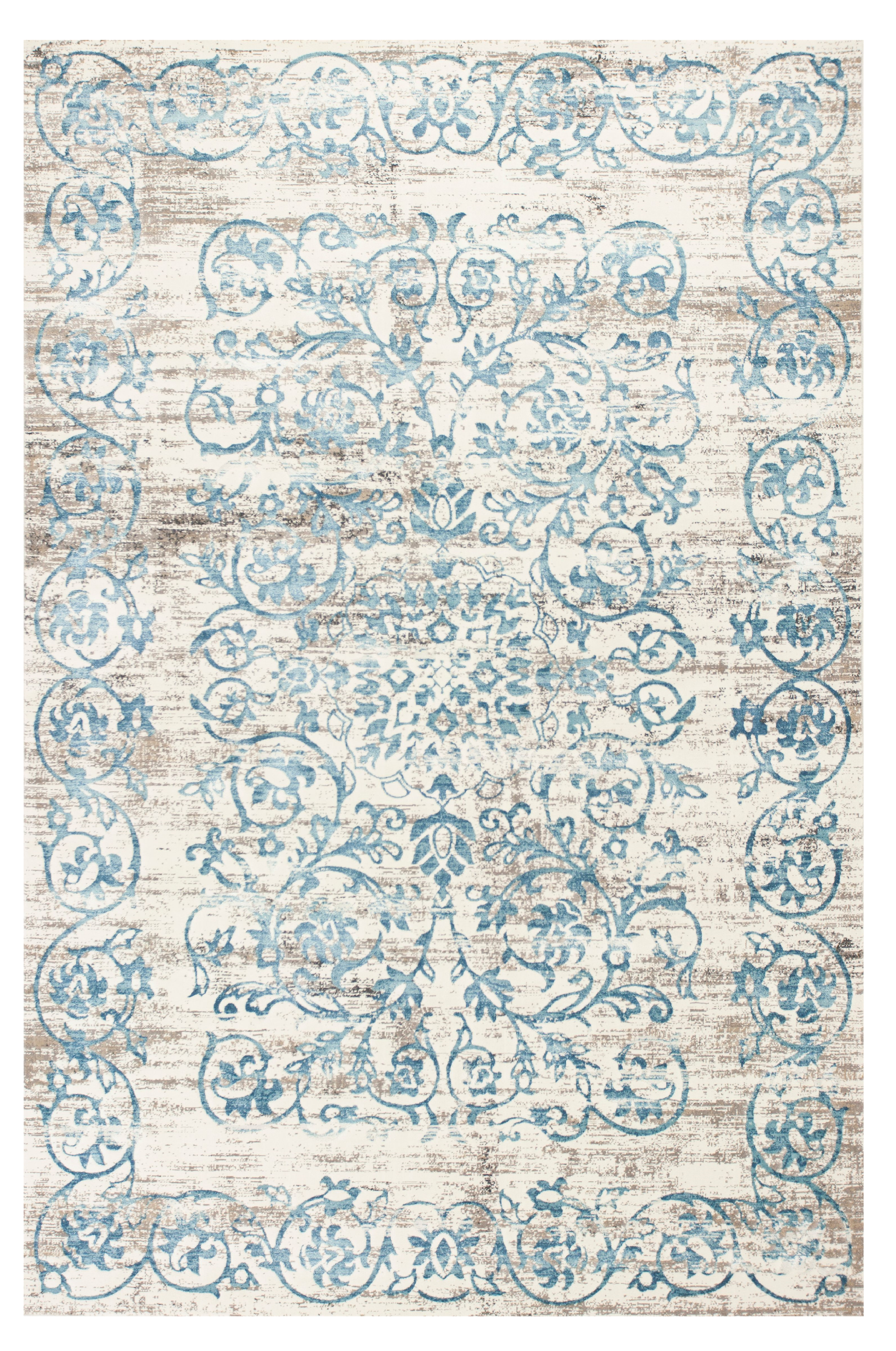 10'x13' Ivory Blue Machine Woven Distressed Floral Indoor Area Rug