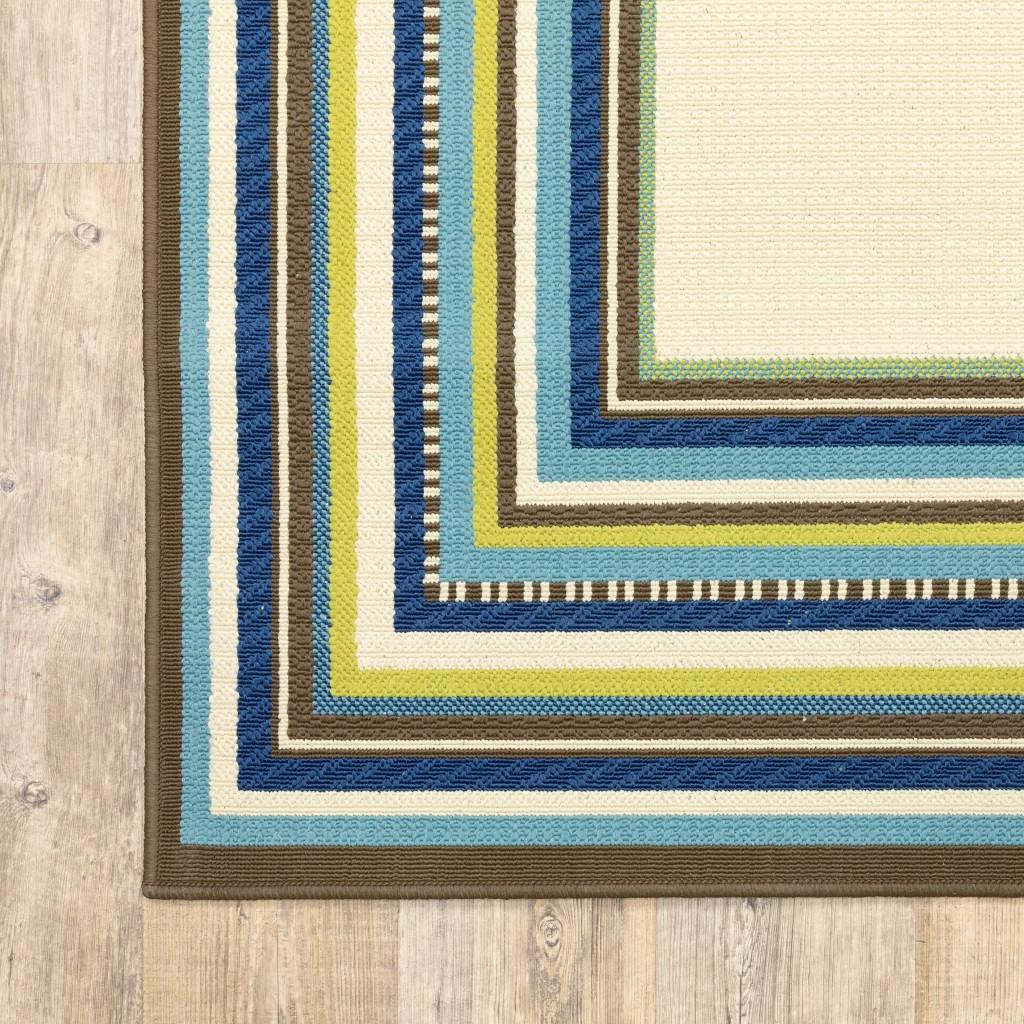 8' Ivory Mediterranean Blue and Lime Border Indoor Outdoor Runner Rug