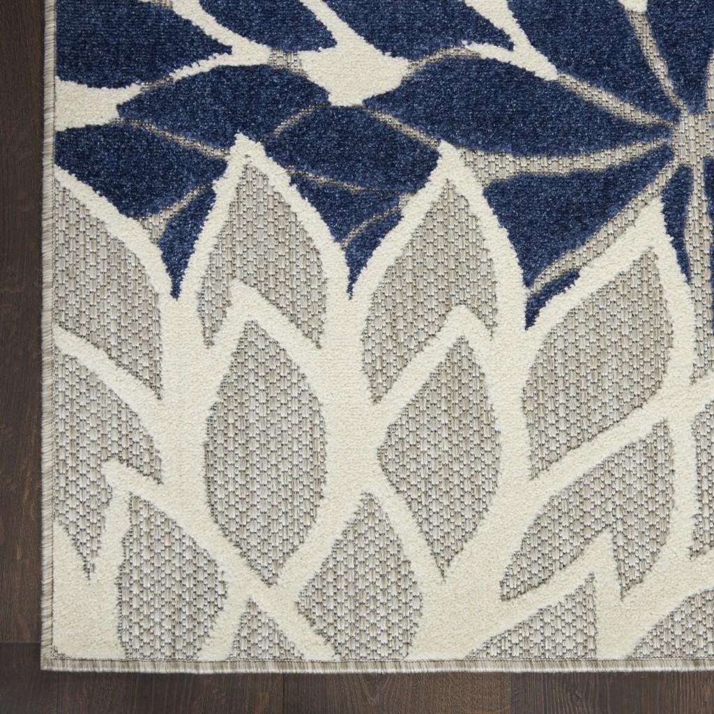 5’ x 8’ Ivory and Navy Indoor Outdoor Area Rug