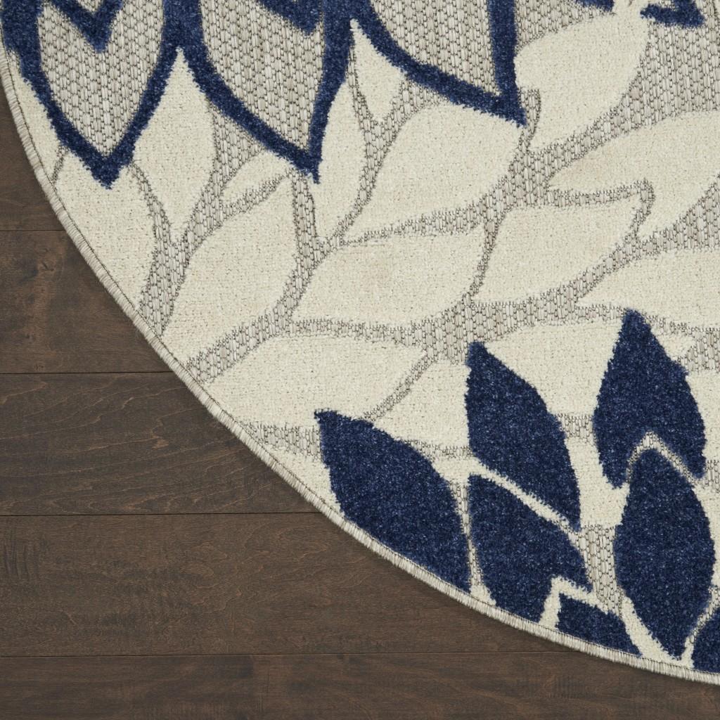 5’ Round Ivory and Navy Indoor Outdoor Area Rug