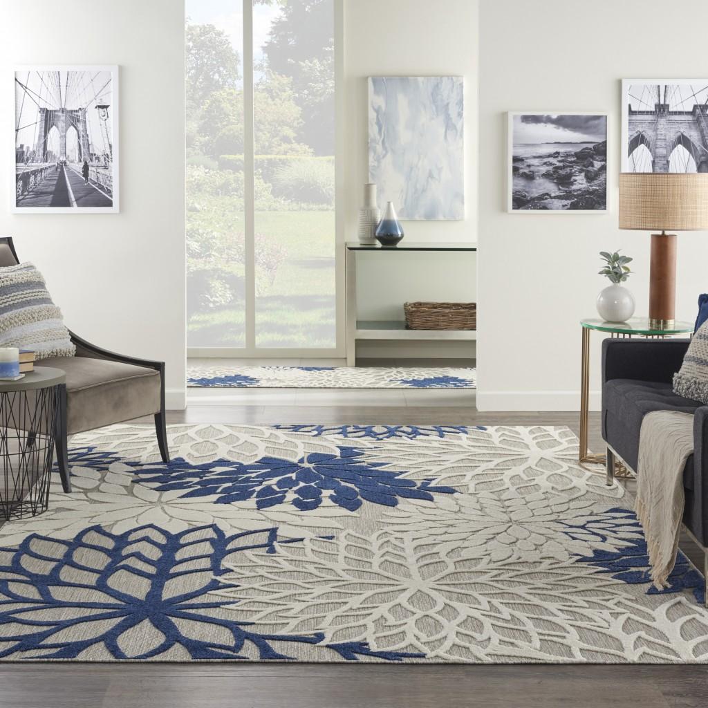 8’ x 11’ Ivory and Navy Indoor Outdoor Area Rug