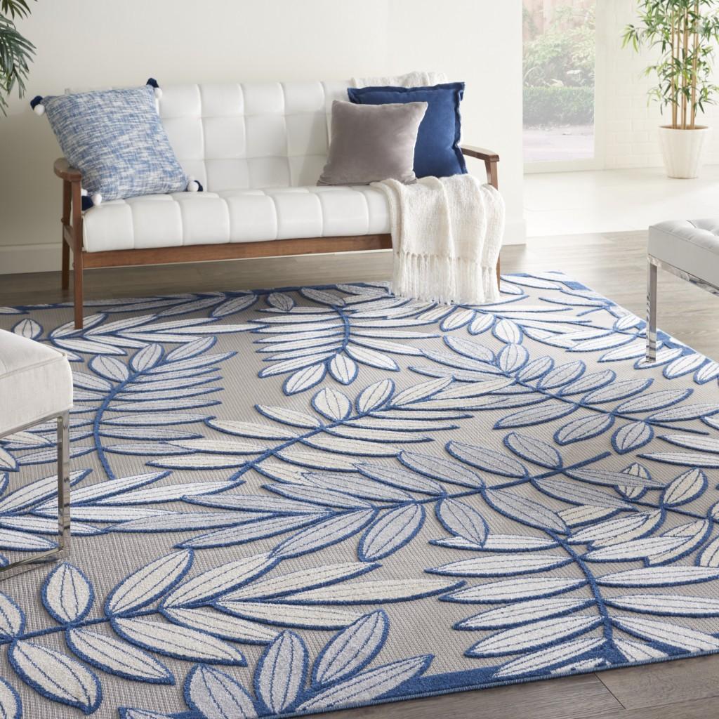 8’ x 11' Ivory and Navy Leaves Indoor Outdoor Area Rug