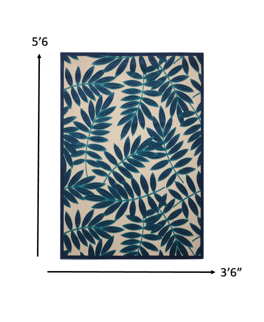 4’ x 6’ Navy and Beige Leaves Indoor Outdoor Area Rug