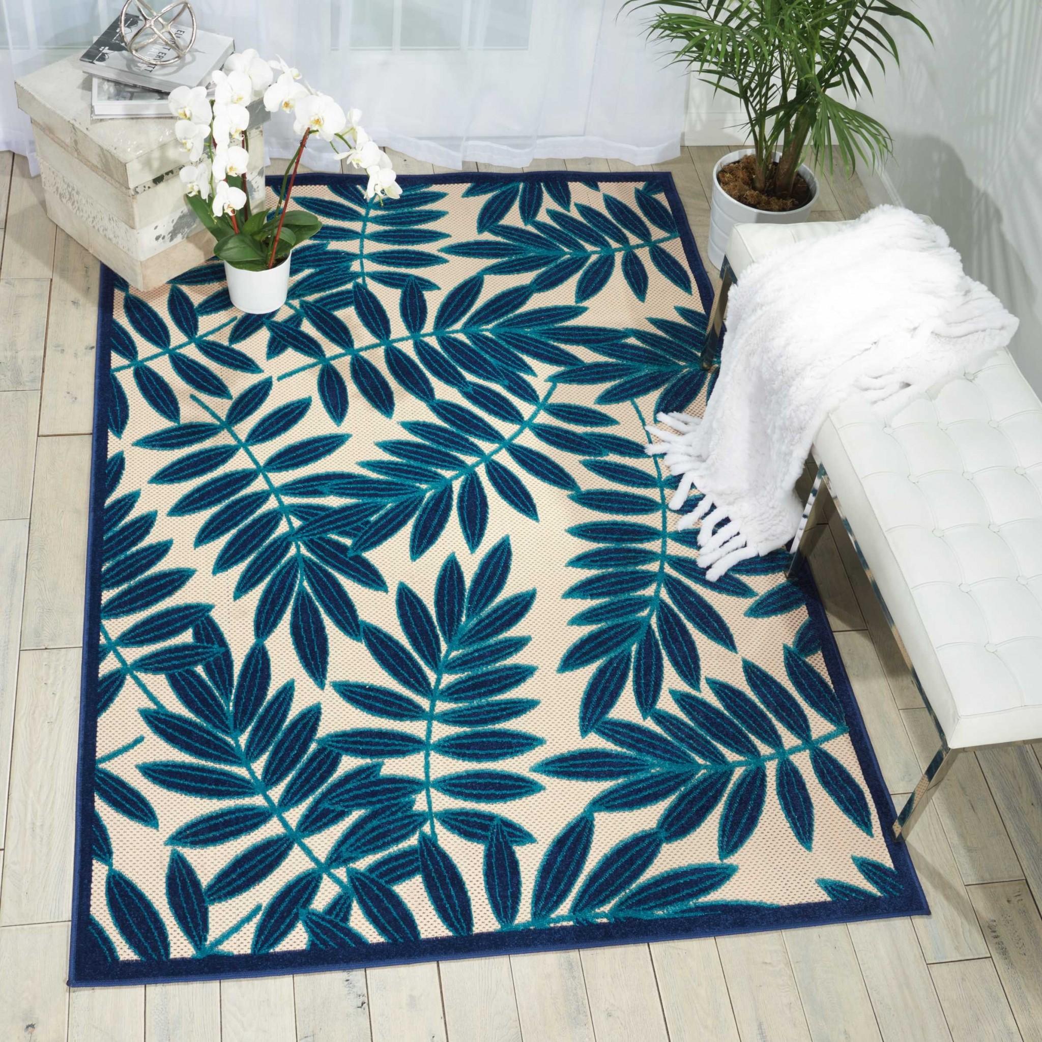 5’ x 8’ Navy and Beige Leaves Indoor Outdoor Area Rug