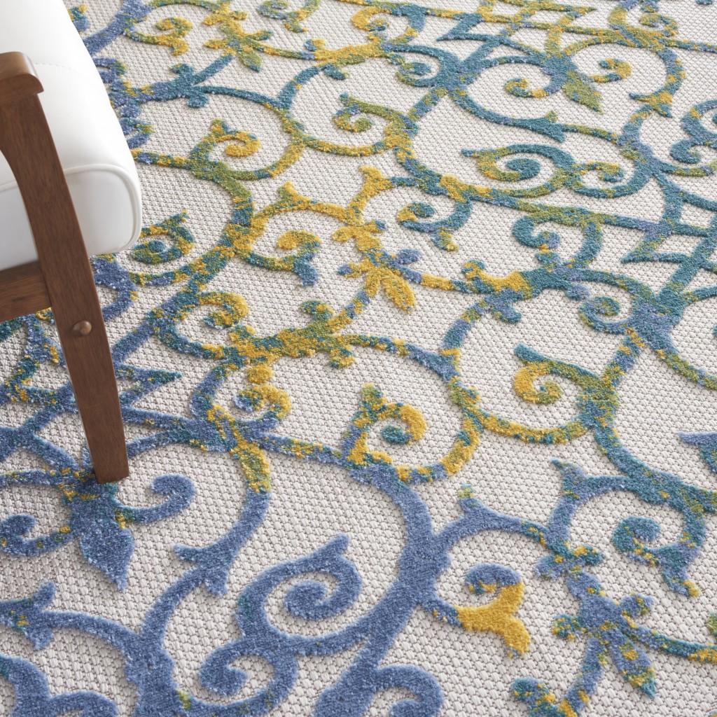 7’ x 10’ Ivory and Blue Indoor Outdoor Area Rug