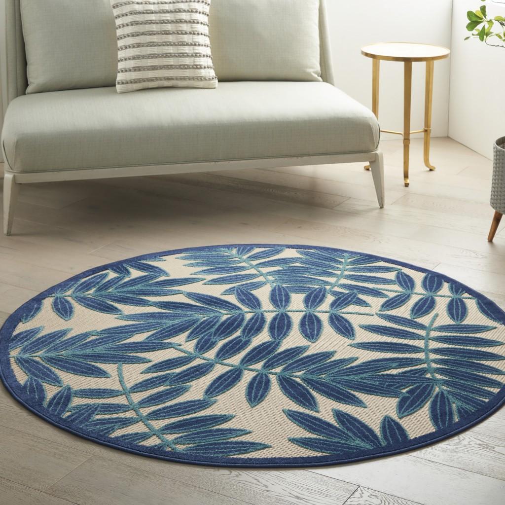 4’ Round Navy and Beige Leaves Indoor Outdoor Area Rug