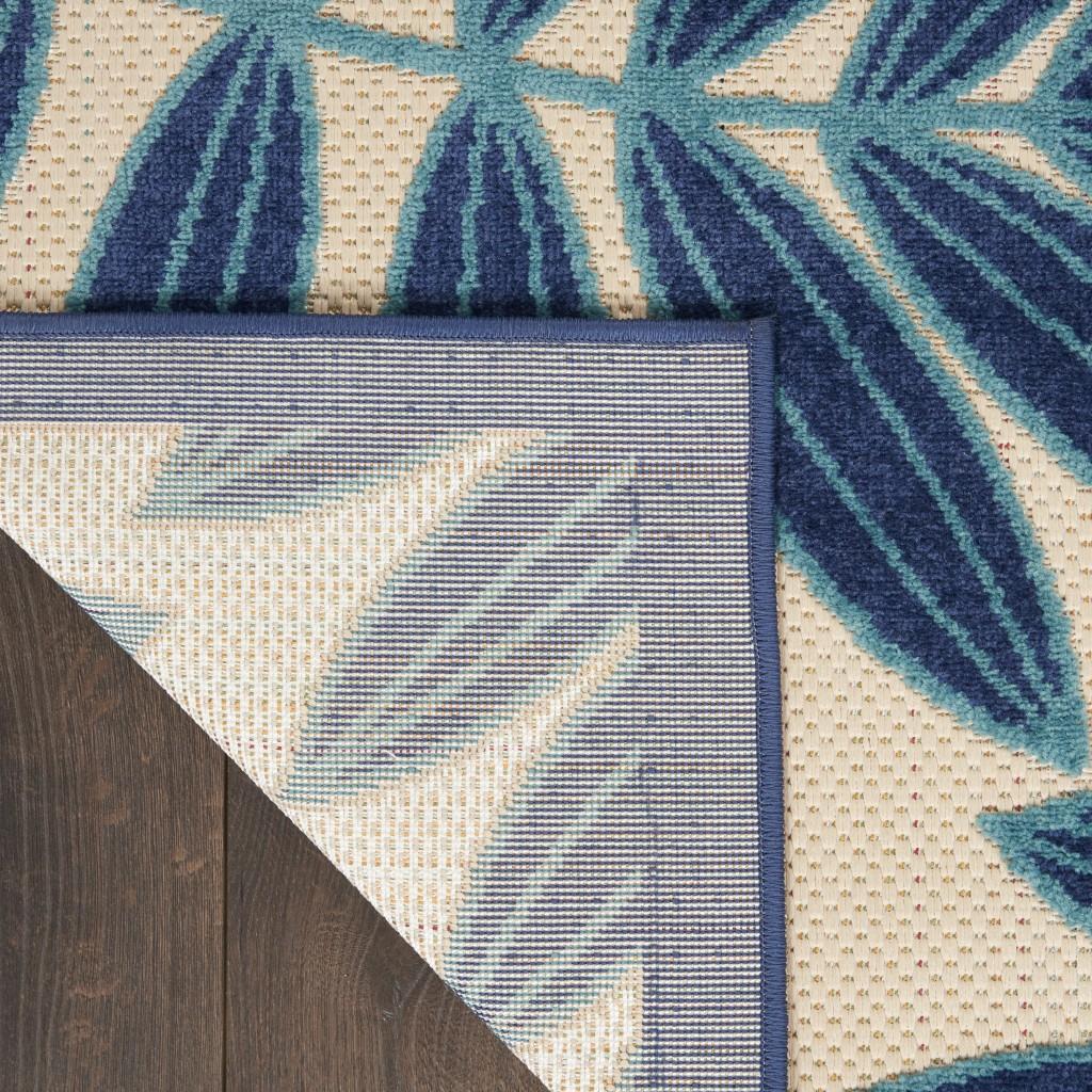 6’ x 9’ Navy and Beige Leaves Indoor Outdoor Area Rug