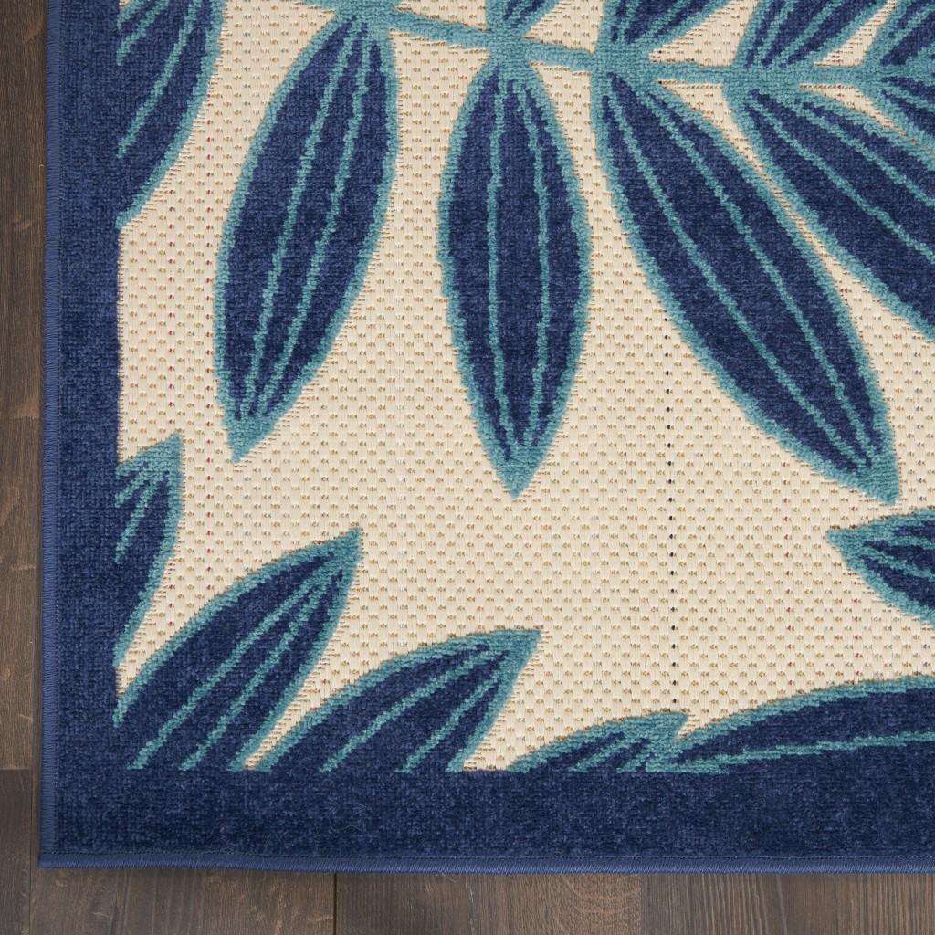 7’ x 10’ Navy and Beige Leaves Indoor Outdoor Area Rug