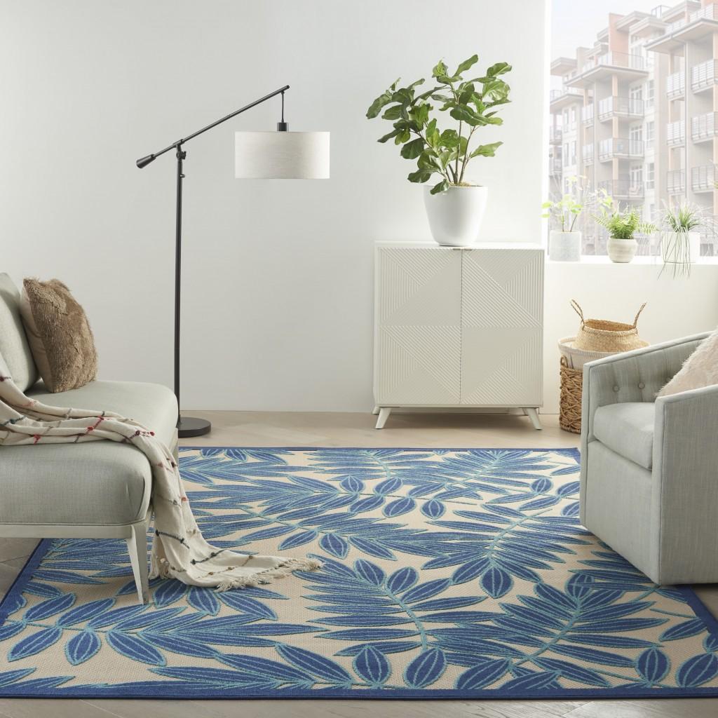 7’ x 10’ Navy and Beige Leaves Indoor Outdoor Area Rug