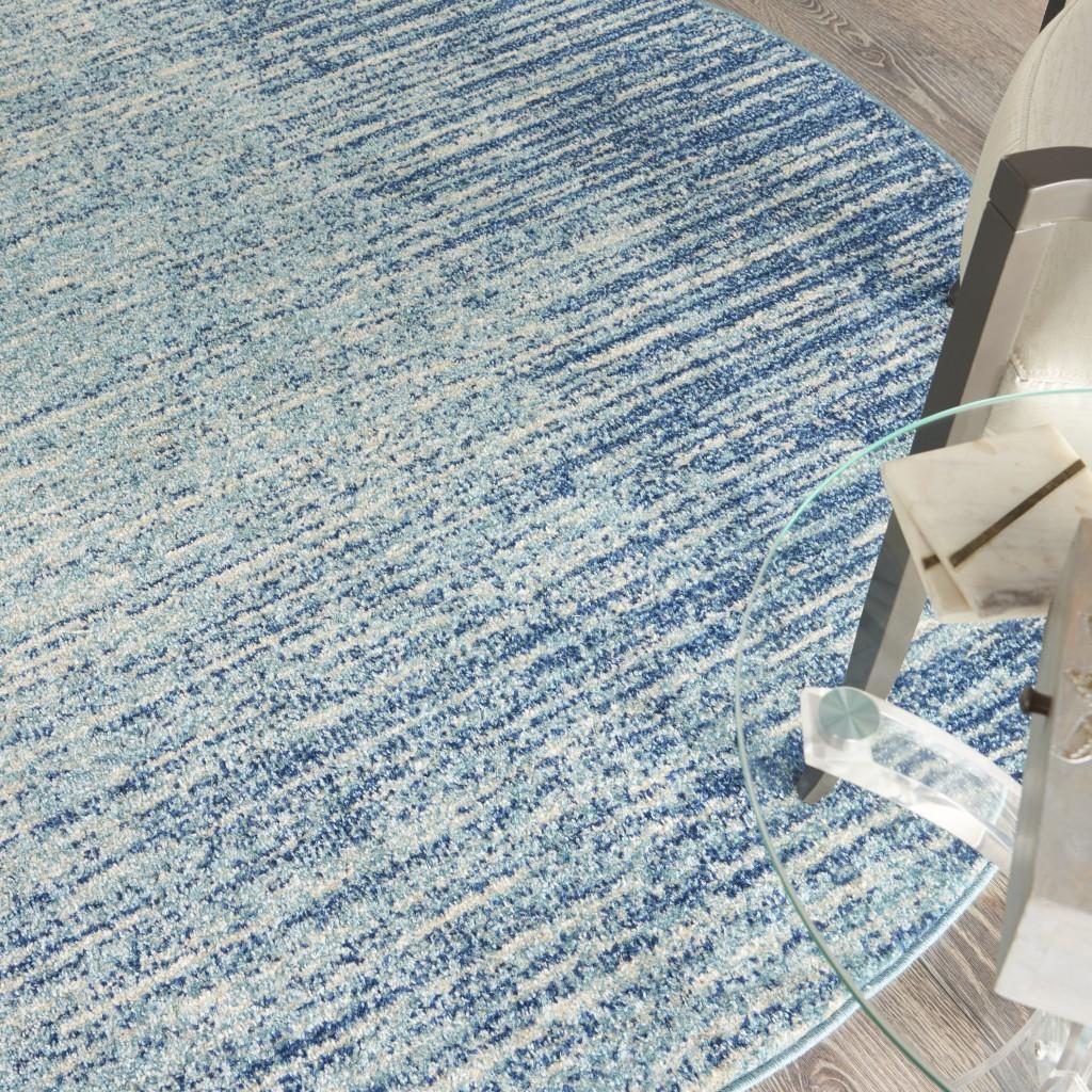 4’ Round Navy and Light Blue Abstract Area Rug