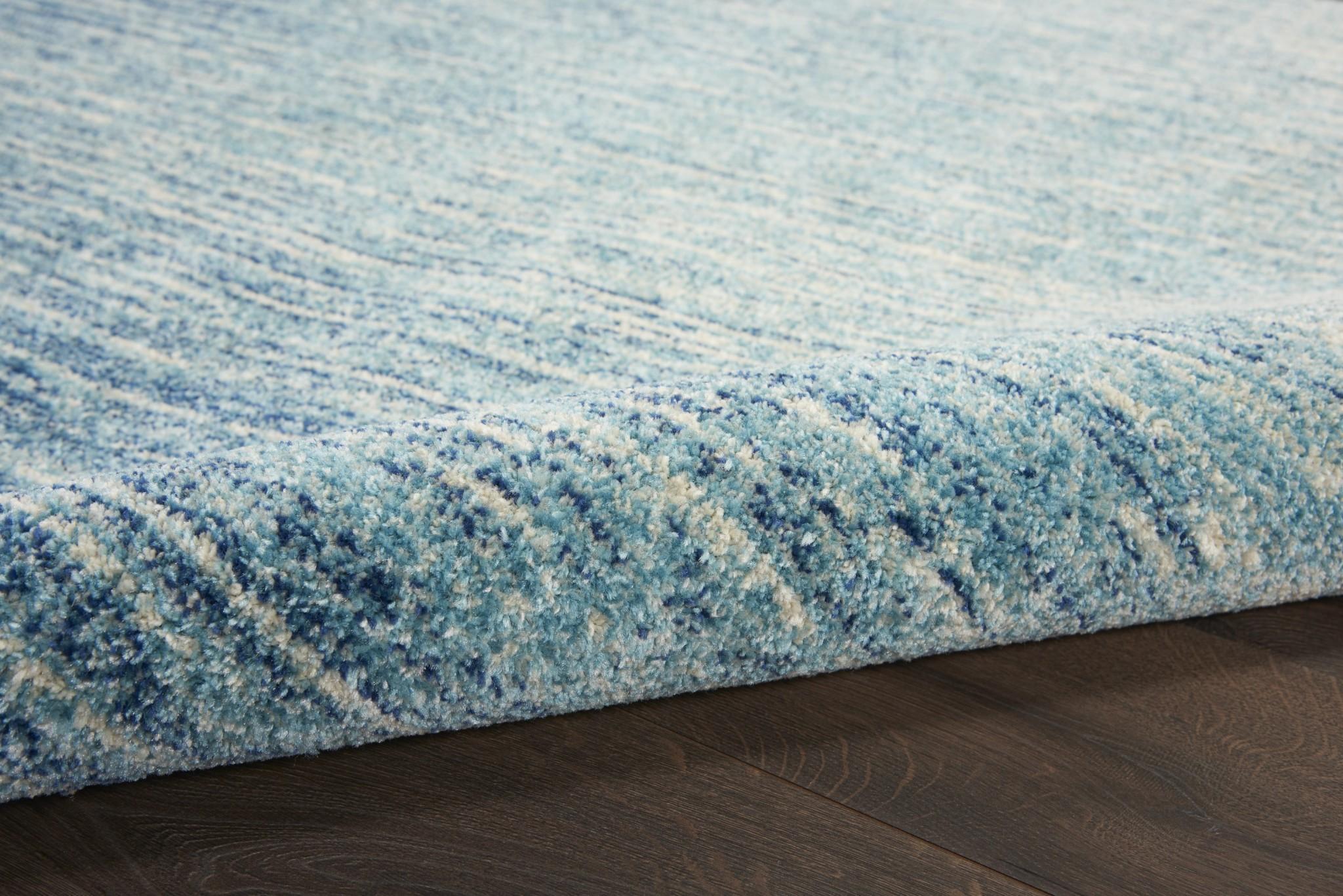 5’ Round Navy and Light Blue Abstract Area Rug