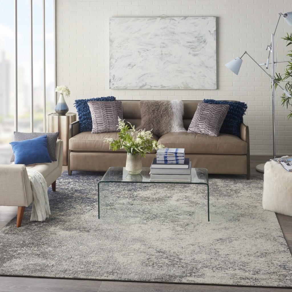 8’ x 10’ Charcoal and Ivory Abstract Area Rug