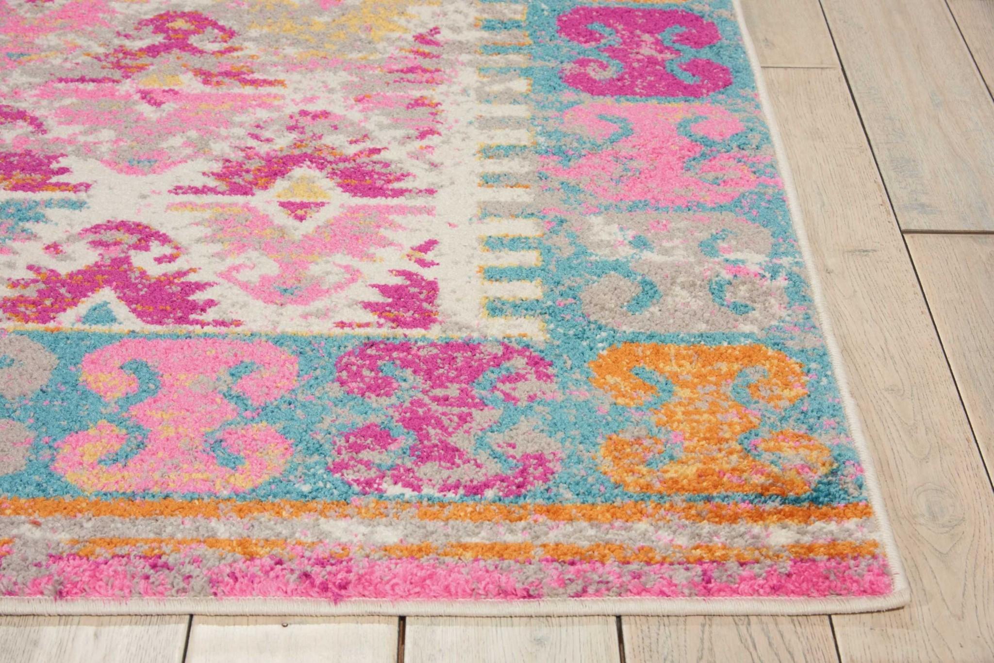 7’ x 10’ Ivory and Magenta Tribal Pattern Area Rug