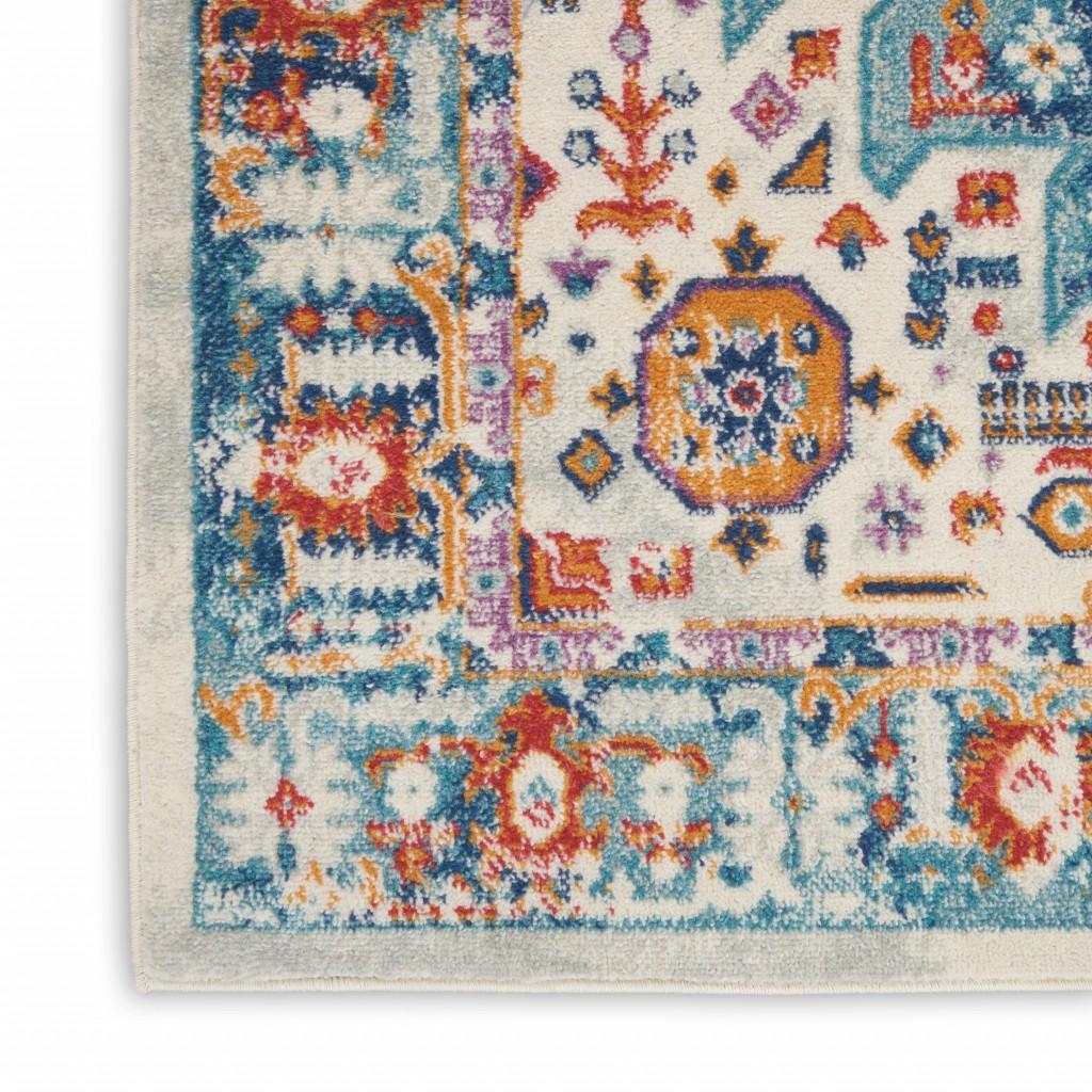 8’ x 10’ Ivory and Blue Floral Motifs Area Rug
