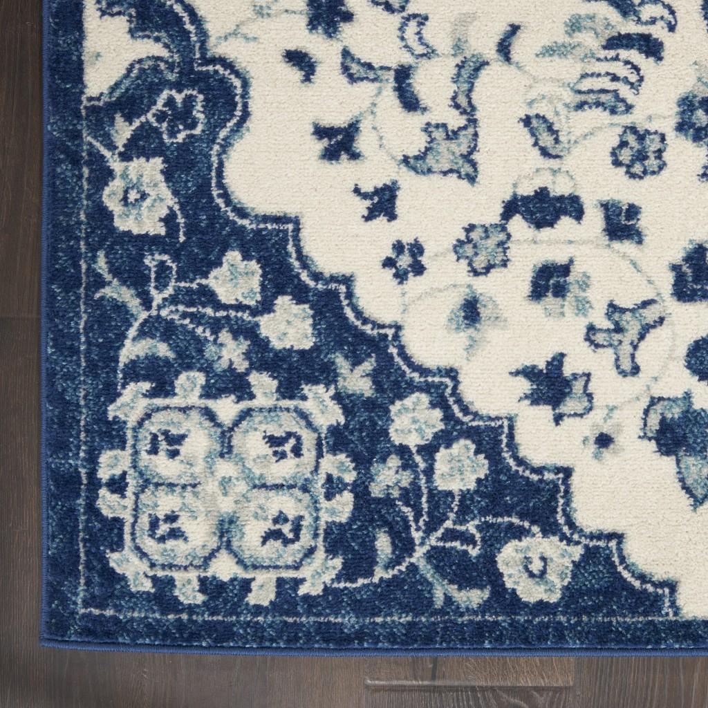 8’ x 10’ Ivory and Blue Medallion Area Rug