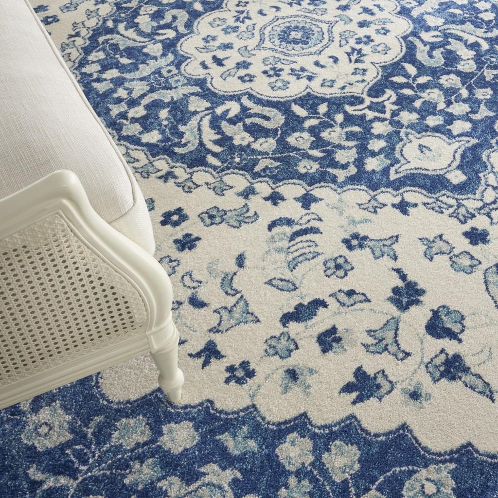 8’ x 10’ Ivory and Blue Medallion Area Rug