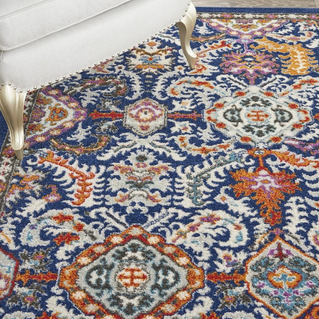 8’ x 10’ Blue and Gold Intricate Area Rug