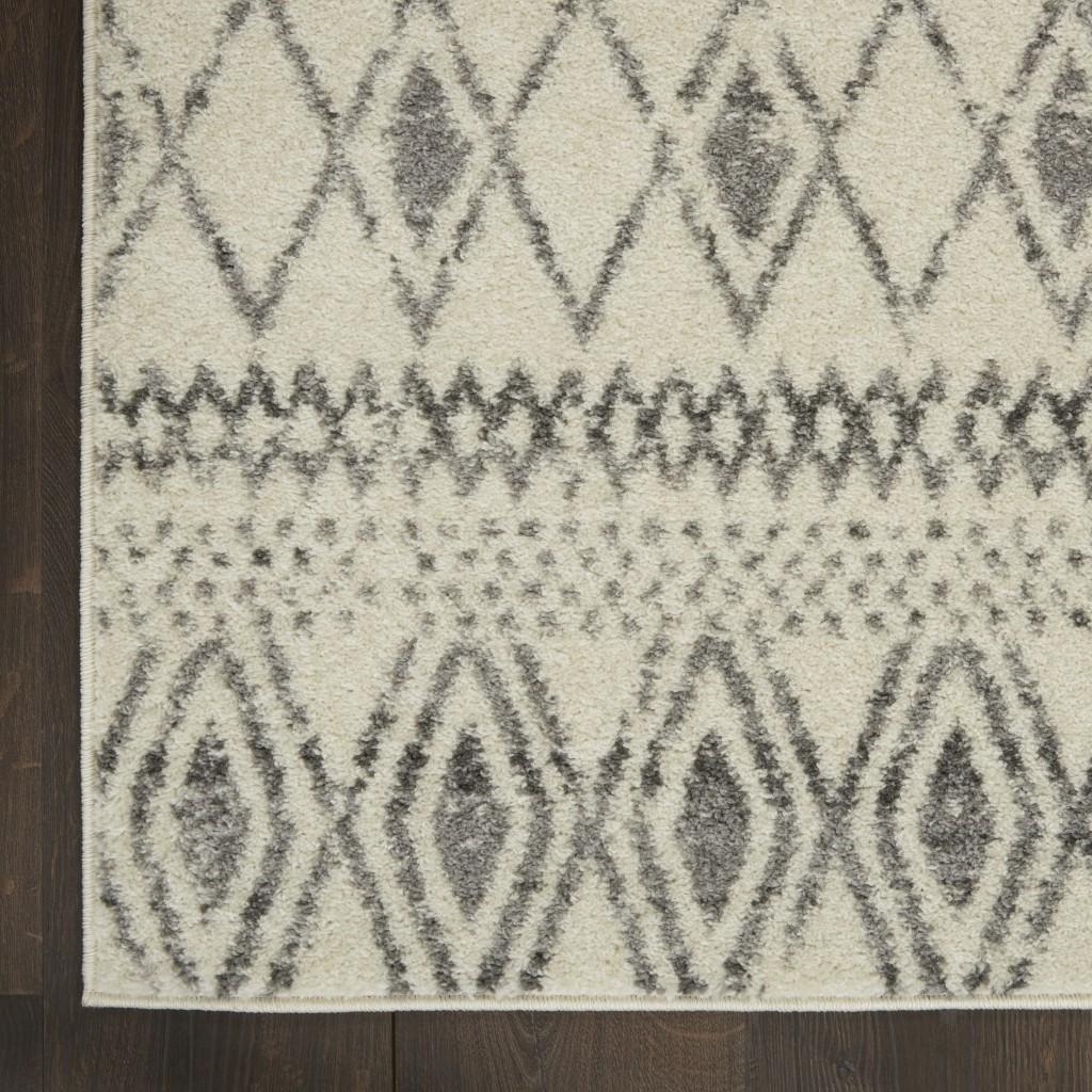 4’ x 6’ Ivory and Gray Berber Pattern Area Rug