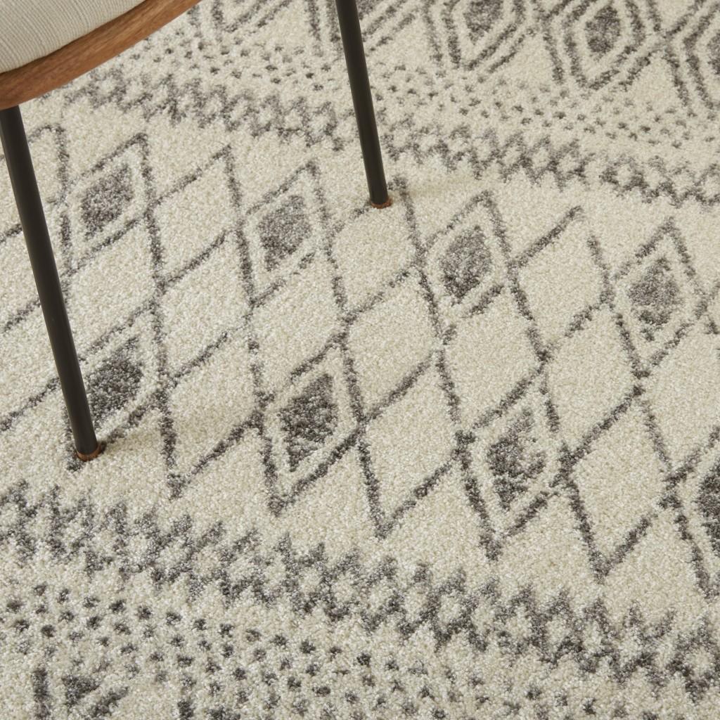 4’ x 6’ Ivory and Gray Berber Pattern Area Rug