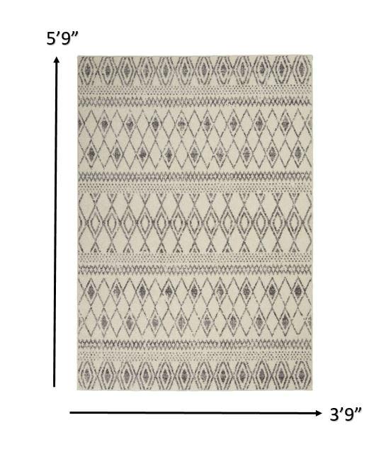 4’ x 6’ Ivory and Gray Berber Pattern Area Rug
