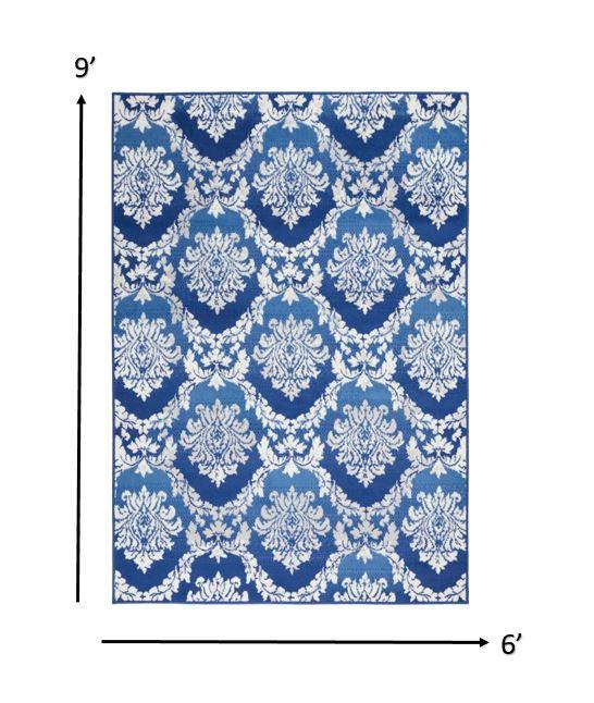 6’ x 9’ Blue and Ivory Damask Area Rug
