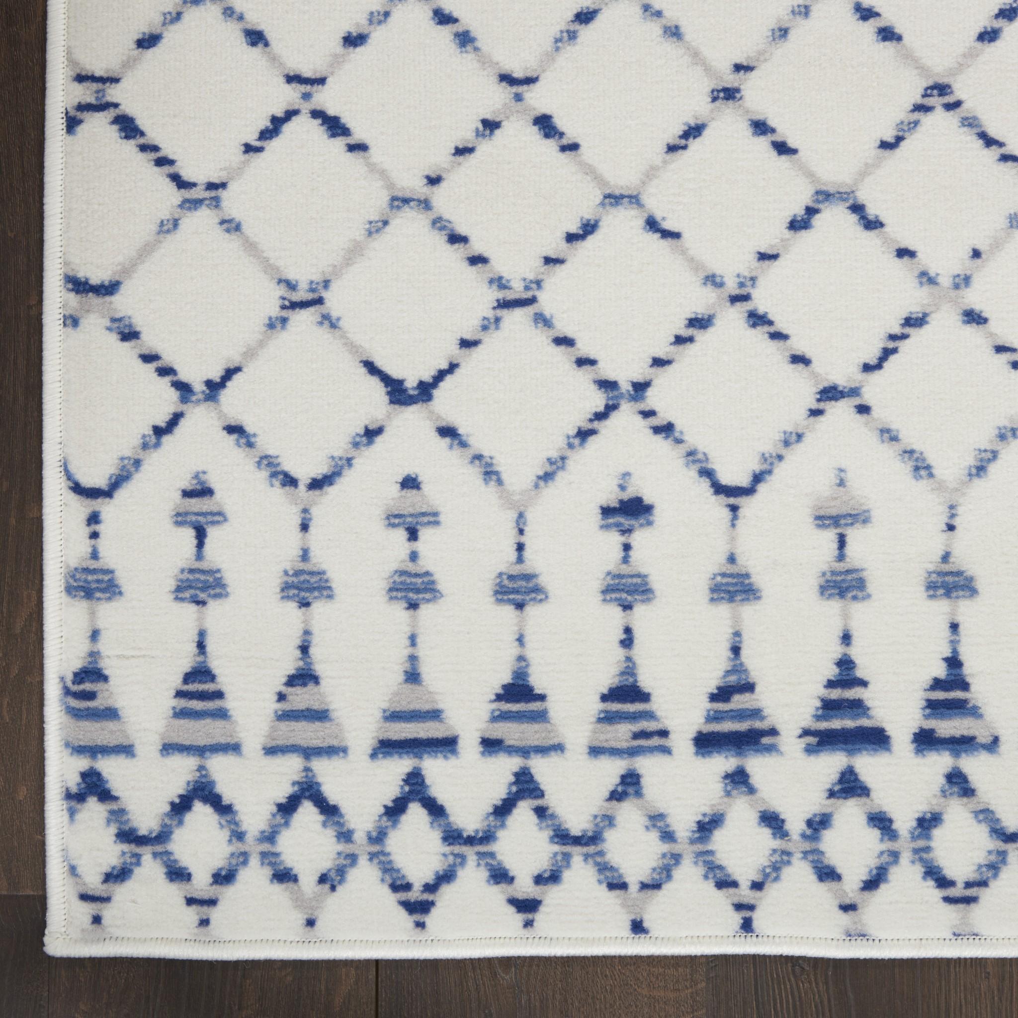 6’ x 9’ Ivory and Blue Berber Pattern Area Rug