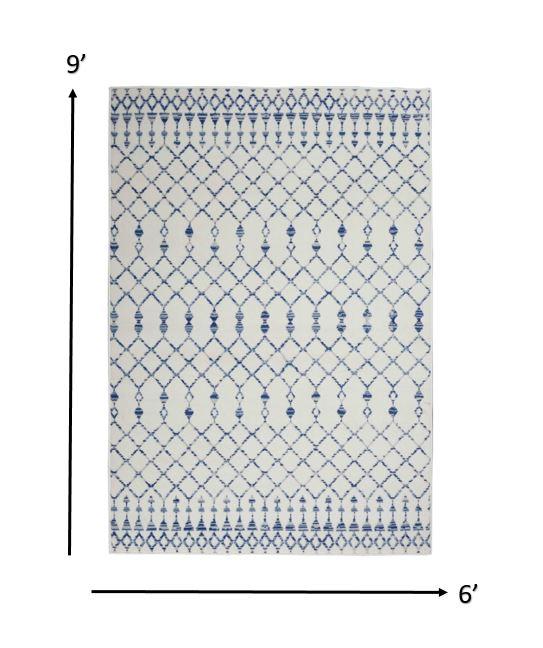 6’ x 9’ Ivory and Blue Berber Pattern Area Rug