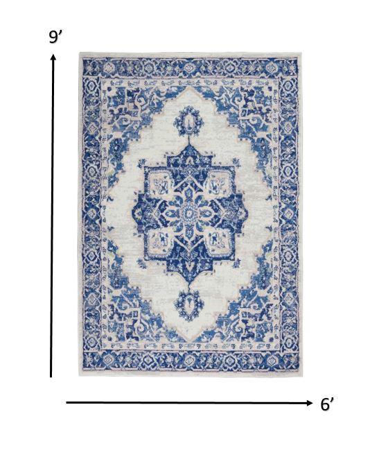 6’ x 9’ Ivory and Blue Persian Medallion Area Rug