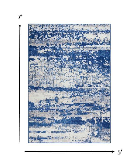 5’ x 7’ Ivory and Navy Oceanic Area Rug