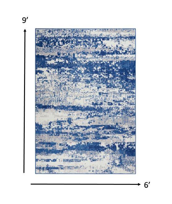 6’ x 9’ Ivory and Navy Oceanic Area Rug