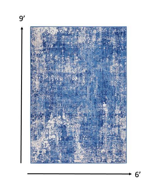 6’ x 9’ Blue and Ivory Abstract Splash Area Rug Default Title