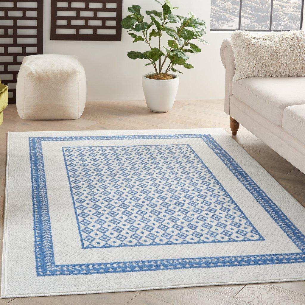 5’ x 7’ Ivory and Blue Geometric Area Rug