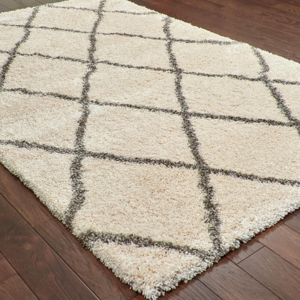 8’ x 11’ Ivory and Gray Geometric Lattice Area Rug