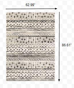 5’ x 7’ Ivory and Black Eclectic Patterns Indoor Area Rug
