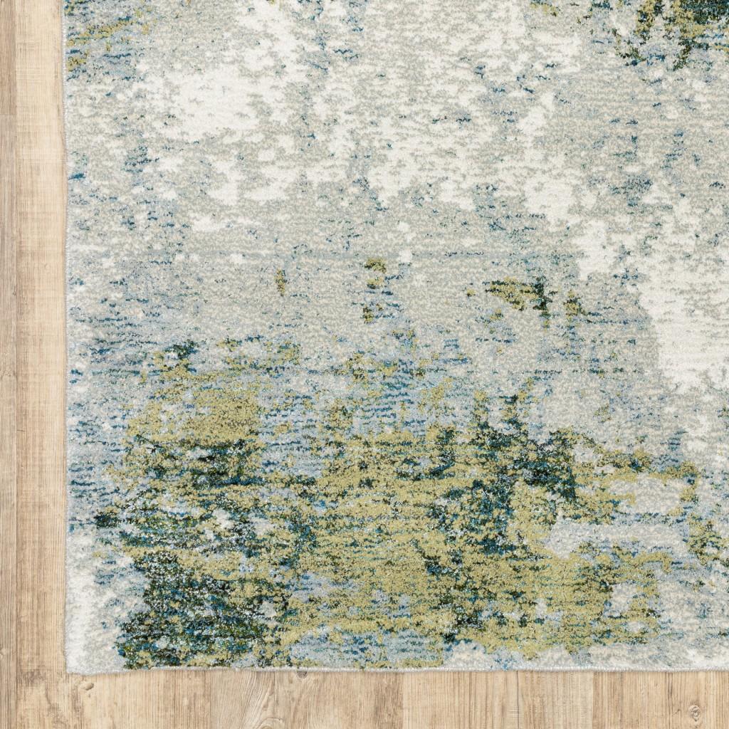 10’ x 13’ Blue and Sage Distressed Waves Indoor Area Rug